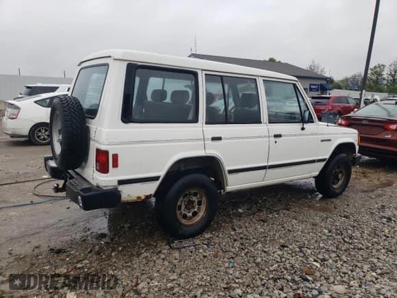 ✅ 1990 Mitsubishi Montero • VIN: JA4GJ31S2LJ003083 • Lot: 73539314. Wystawiony na Copart z przebiegiem 115 191 mil. Bezpłatny archiwum sprzedaży aukcyjnych z USA i szczegółowy raport historii pojazdu na DreamBid. Zdjęcie 3.