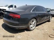 ✅ 2015 Audi A8 3.0L TDI • VIN: WAU3MAFD2FN006795 • Lot: 51791283. Listed on Copart with 106,415 mi. Free auction sales archive from the USA and detailed vehicle history report at DreamBid. Image 3.