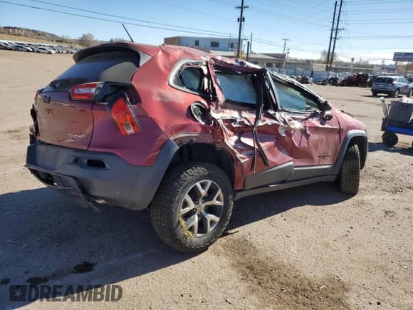 ✅ 2015 Jeep Cherokee Trailhawk • VIN: 1C4PJMBS4FW577590 • Lot: 92803025. Listed on Copart with 163,417 mi. Free auction sales archive from the USA and detailed vehicle history report at DreamBid. Image 3.