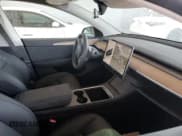 ✅ 2024 Tesla Model Y Long Range • VIN: 7SAYGDEE8RA226005 • Lot: 93294135. Listed on Copart with 15,121 mi. Free auction sales archive from the USA and detailed vehicle history report at DreamBid. Image 7.