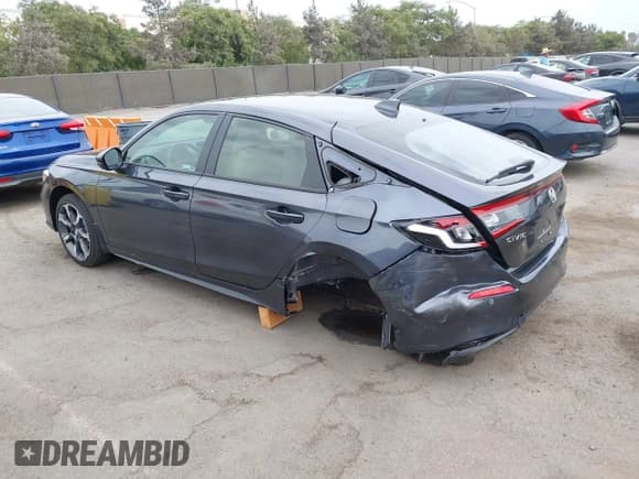 ✅ 2025 Honda Civic Sport Touring • VIN: JHMFL4H91SX003848 • Lot: 43075678. Listed on IAAI with 1,885 mi. Free auction sales archive from the USA and detailed vehicle history report at DreamBid. Image 3.