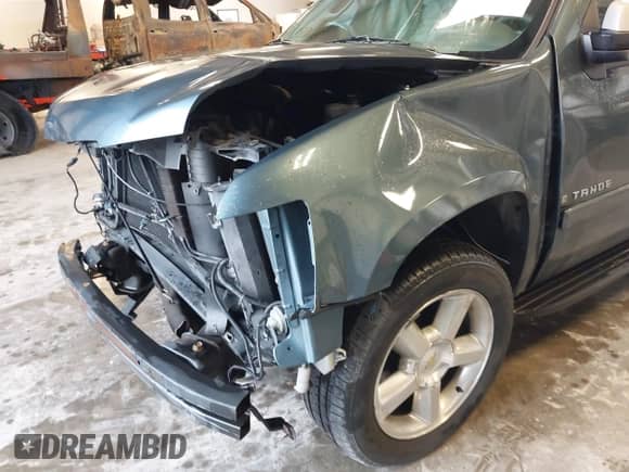 2008 Chevrolet Tahoe 2LT z VIN 1GNFC13J68R275771, wystawiony jako IAAI lot #41943109 z przebiegiem 170 550 mil mil oraz . Historia ofert i sprzedaży dostępna na DreamBid. Obrazek 12.