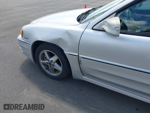 ✅ 2001 Pontiac Grand Am GT • VIN: 1G2NW52E91C276434 • Лот: 42221637. Опубликован ранее на IAAI с пробегом 365 701 миль. Бесплатный доступ к архиву аукционных продаж из США и подробный отчёт об истории автомобиля на DreamBid. Изображение 6.