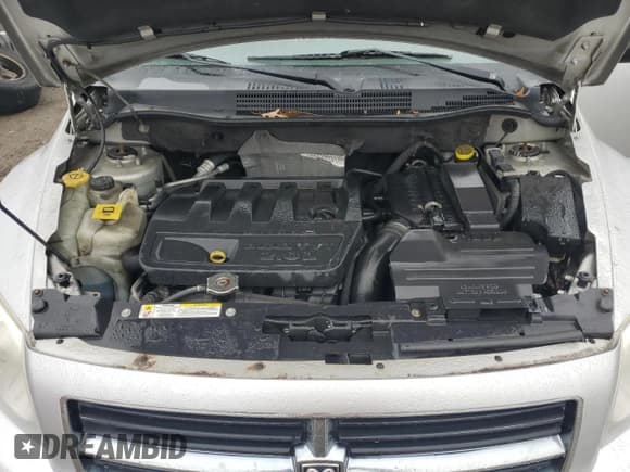 ✅ 2007 Dodge Caliber SXT • VIN: 1B3HB48B27D412421 • Лот: 84147904. Опубликован ранее на Copart с пробегом 173 836 миль. Бесплатный доступ к архиву аукционных продаж из США и подробный отчёт об истории автомобиля на DreamBid. Изображение 11.