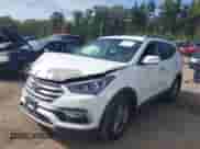 2018 Hyundai Santa Fe 2.4L z VIN 5NMZUDLB6JH078395, wystawiony jako IAAI lot #43277067 z przebiegiem 82 038 mil mil oraz . Historia ofert i sprzedaży dostępna na DreamBid. Obrazek 18.