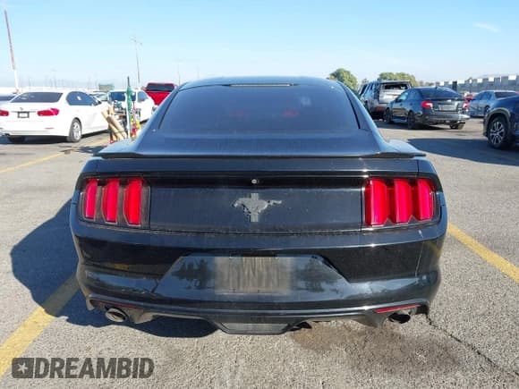 ✅ 2016 Ford Mustang V6 • VIN: 1FA6P8AM4G5284189 • Lot: 43599290. Listed on IAAI with 66,830 mi. Free auction sales archive from the USA and detailed vehicle history report at DreamBid. Image 16.