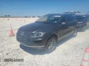 ✅ 2016 Volkswagen Touareg Lux • VIN: WVGEP9BP3GD000864 • Lot: 53977885. Listed on Copart with 167,161 mi. Free auction sales archive from the USA and detailed vehicle history report at DreamBid. Image 1.