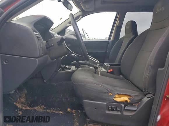 ✅ 2004 Jeep Grand Cherokee Laredo • VIN: 1J4GW48J24C221387 • Lot: 95369865. Wystawiony na Copart z przebiegiem 173 119 mil. Bezpłatny archiwum sprzedaży aukcyjnych z USA i szczegółowy raport historii pojazdu na DreamBid. Zdjęcie 7.