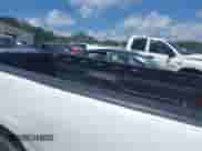 2004 Chevrolet Silverado 1500 z VIN 1GCEC14X04Z294723, wystawiony jako IAAI lot #42314001 z przebiegiem 217 834 mil mil oraz . Historia ofert i sprzedaży dostępna na DreamBid. Obrazek 8.