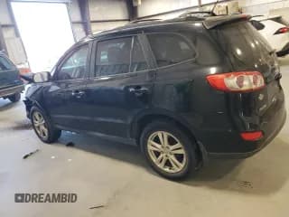 ✅ 2011 Hyundai Santa Fe SE • VIN: 5XYZH4AG3BG049192 • Lot: 77219474. Listed on Copart with 293,531 mi. Free auction sales archive from the USA and detailed vehicle history report at DreamBid. Image 2.