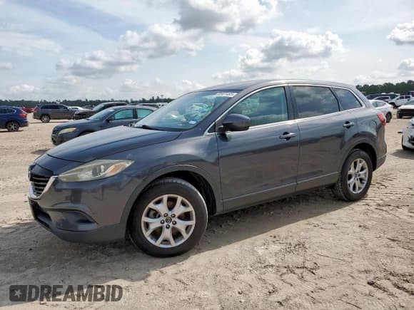 ✅ 2015 Mazda CX-9 Touring • VIN: JM3TB3CA7F0450628 • Lot: 60561465. Listed on Copart with 137,919 mi. Free auction sales archive from the USA and detailed vehicle history report at DreamBid. Image 1.