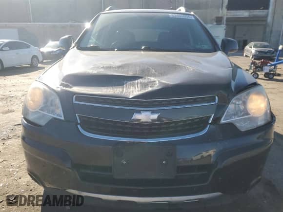 2012 Chevrolet Captiva Sport LT z VIN 3GNAL3E5XCS613703, wystawiony jako Copart lot #83405654 z przebiegiem 128 792 mil mil oraz Szkoda całkowita • Salvage title. Historia ofert i sprzedaży dostępna na DreamBid. Obrazek 5.