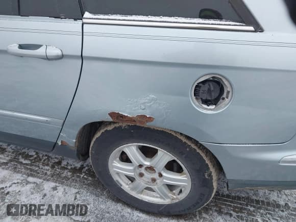 ✅ 2005 Chrysler Pacifica Touring • VIN: 2C4GM684X5R509054 • Lot: 43911461. Listed on IAAI with 186,436 mi. Free auction sales archive from the USA and detailed vehicle history report at DreamBid. Image 6.