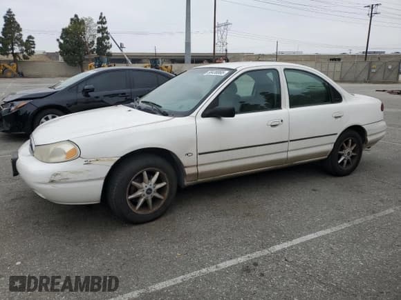 ✅ 1998 Ford Contour • VIN: 3FALP6536WM114921 • Лот: 58438865. Опубликован ранее на Copart с пробегом 99 547 миль. Бесплатный доступ к архиву аукционных продаж из США и подробный отчёт об истории автомобиля на DreamBid. Изображение 1.