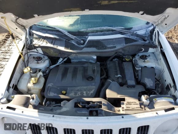 ✅ 2007 Jeep Patriot Sport • VIN: 1J8FF28WX7D355881 • Lot: 82766473. Listed on Copart with 120,519 mi. Free auction sales archive from the USA and detailed vehicle history report at DreamBid. Image 12.