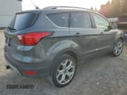 ✅ 2019 Ford Escape Titanium • VIN: 1FMCU9J98KUB22874 • Lot: 94294725. Wystawiony na Copart z przebiegiem 31 501 mil. Bezpłatny archiwum sprzedaży aukcyjnych z USA i szczegółowy raport historii pojazdu na DreamBid. Zdjęcie 3.