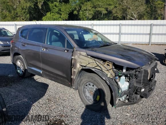 ✅ 2019 Hyundai Santa Fe SE • VIN: 5NMS23AD9KH101451 • Lot: 91171595. Listed on Copart with 127,277 mi. Free auction sales archive from the USA and detailed vehicle history report at DreamBid. Image 4.