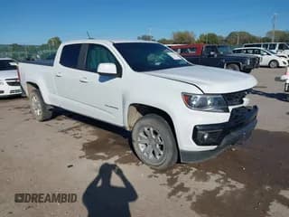 ✅ 2021 Chevrolet Colorado 2WD LT • VIN: 1GCGSCEN7M1266596 • Lot: 43570247. Listed on IAAI with 82,051 mi. Free auction sales archive from the USA and detailed vehicle history report at DreamBid. Image 1.