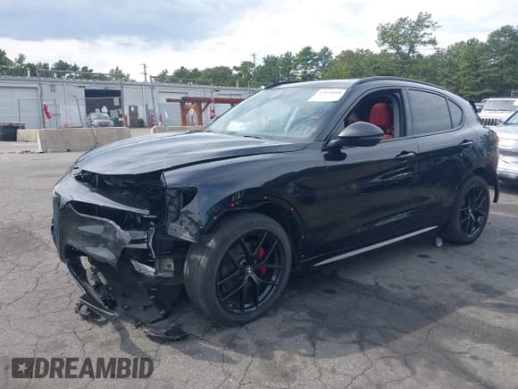 ✅ 2021 Alfa Romeo Stelvio Ti • VIN: ZASPAKBN3M7D20594 • Lot: 43054004. Listed on IAAI with 36,371 mi. Free auction sales archive from the USA and detailed vehicle history report at DreamBid. Image 2.