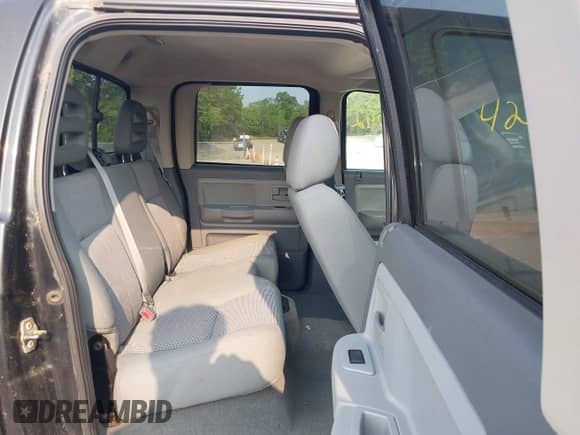 2007 Dodge Dakota SLT with VIN 1D7HW48K97S138512, listed as a IAAI auction lot 42386042 with 146,629 mi miles and . Bid and sale history available at DreamBid. Image 8.