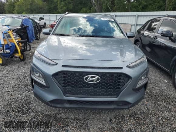 2021 Hyundai Kona SEL z VIN KM8K22AA2MU630215, wystawiony jako Copart lot #85161555 z przebiegiem 38 927 mil mil oraz Nie do naprawy • Non repairable. Historia ofert i sprzedaży dostępna na DreamBid. Obrazek 5.