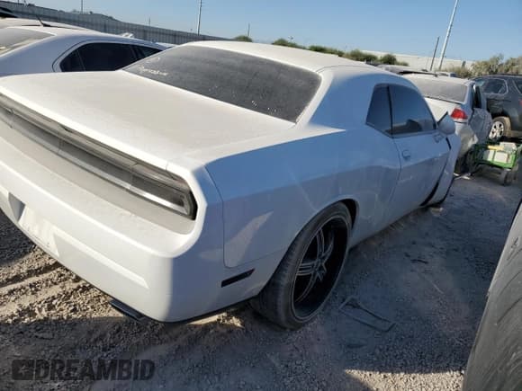 ✅ 2013 Dodge Challenger SXT • VIN: 2C3CDYAG5DH670273 • Lot: 67798934. Wystawiony na Copart z przebiegiem Nie podano. Bezpłatny archiwum sprzedaży aukcyjnych z USA i szczegółowy raport historii pojazdu na DreamBid. Zdjęcie 3.
