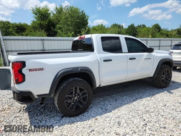 ✅ 2024 Chevrolet Colorado 4WD Trail Boss • VIN: 1GCPTEEK1R1307598 • Лот: 69098645. Опубликован ранее на Copart с пробегом 7 010 миль. Бесплатный доступ к архиву аукционных продаж из США и подробный отчёт об истории автомобиля на DreamBid. Изображение 3.