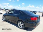 ✅ 2012 Volkswagen Jetta TDI w/Premium & Nav • VIN: 3VWLL7AJ0CM410008 • Lot: 43011566. Listed on IAAI with 207,018 mi. Free auction sales archive from the USA and detailed vehicle history report at DreamBid. Image 3.