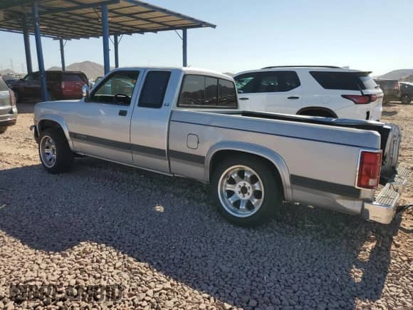 1991 Dodge Dakota с VIN 1B7GL23Y3MS309507, выставлен на аукционе Copart как лот 58079905 с пробегом 90 932 миль миль и Списание • Salvage title. История ставок и продаж доступна на DreamBid. Изображение 2.