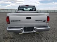 ✅ 2003 Dodge Dakota SLT • VIN: 1D7HG48NX3S261527 • Lot: 52986385. Wystawiony na Copart z przebiegiem 163 807 mil. Bezpłatny archiwum sprzedaży aukcyjnych z USA i szczegółowy raport historii pojazdu na DreamBid. Zdjęcie 6.
