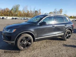 ✅ 2017 Volkswagen Touareg Wolfsburg Edition • VIN: WVGRF7BP1HD001263 • Лот: 82233955. Опубликован ранее на Copart с пробегом 78 603 миль. Бесплатный доступ к архиву аукционных продаж из США и подробный отчёт об истории автомобиля на DreamBid. Изображение 1.