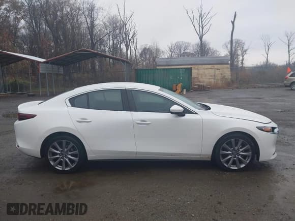 ✅ 2021 Mazda 3 Select • VIN: JM1BPABL4M1319578 • Лот: 43771777. Опубликован ранее на IAAI с пробегом 83 317 миль. Бесплатный доступ к архиву аукционных продаж из США и подробный отчёт об истории автомобиля на DreamBid. Изображение 13.