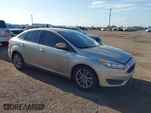 ✅ 2018 Ford Focus SE • VIN: 1FADP3FEXJL244276 • Lot: 43229577. Listed on IAAI with 93,902 mi. Free auction sales archive from the USA and detailed vehicle history report at DreamBid. Image 1.
