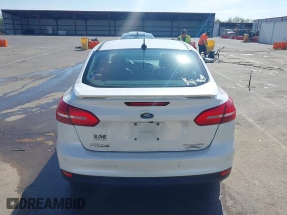 ✅ 2016 Ford Focus Titanium • VIN: 1FADP3J23GL358772 • Лот: 42103694. Опубликован ранее на IAAI с пробегом 85 290 миль. Бесплатный доступ к архиву аукционных продаж из США и подробный отчёт об истории автомобиля на DreamBid. Изображение 16.