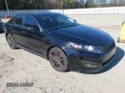 ✅ 2013 Kia Optima SX • VIN: 5XXGR4A6XDG182485 • Lot: 43670313. Listed on IAAI with 157,213 mi. Free auction sales archive from the USA and detailed vehicle history report at DreamBid. Image 1.