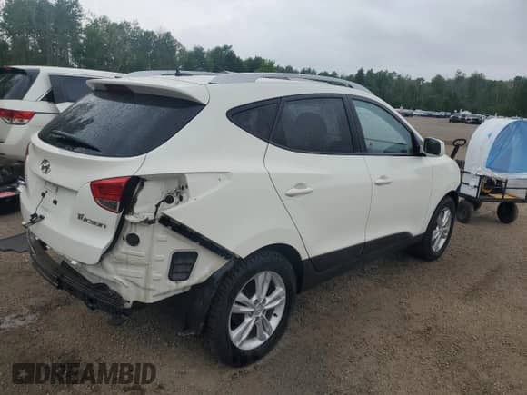 2012 Hyundai Tucson GLS z VIN KM8JU3AC5CU336187, wystawiony jako Copart lot #58704075 z przebiegiem 106 448 mil mil oraz Czysty tytuł • Clean title. Historia ofert i sprzedaży dostępna na DreamBid. Obrazek 3.