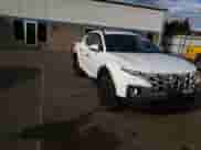 2022 Hyundai Santa Cruz SEL z VIN 5NTJCDAE8NH027701, wystawiony jako Copart lot #81574174 z przebiegiem 65 414 mil mil oraz Szkoda całkowita • Salvage title. Historia ofert i sprzedaży dostępna na DreamBid. Obrazek 10.