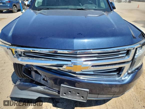 2019 Chevrolet Suburban Premier with VIN 1GNSCJKCXKR110511, listed as a Copart auction lot 71028945 with 87,669 mi miles and Salvage title. Bid and sale history available at DreamBid. Image 12.