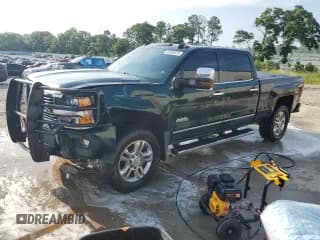 ✅ 2015 Chevrolet Silverado 2500HD High Country • VIN: 1GC1KXE89FF646214 • Lot: 59868625. Listed on Copart with 186,075 mi. Free auction sales archive from the USA and detailed vehicle history report at DreamBid. Image 1.