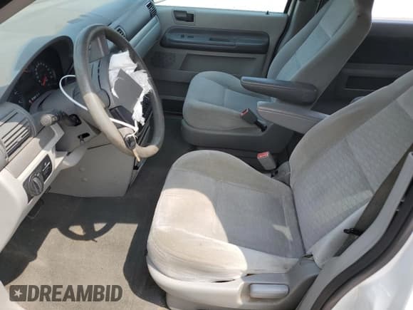 ✅ 2005 Ford Freestar SE • VIN: 2FMDA51665BA45489 • Лот: 60712785. Опубликован ранее на Copart с пробегом Не указан. Бесплатный доступ к архиву аукционных продаж из США и подробный отчёт об истории автомобиля на DreamBid. Изображение 7.