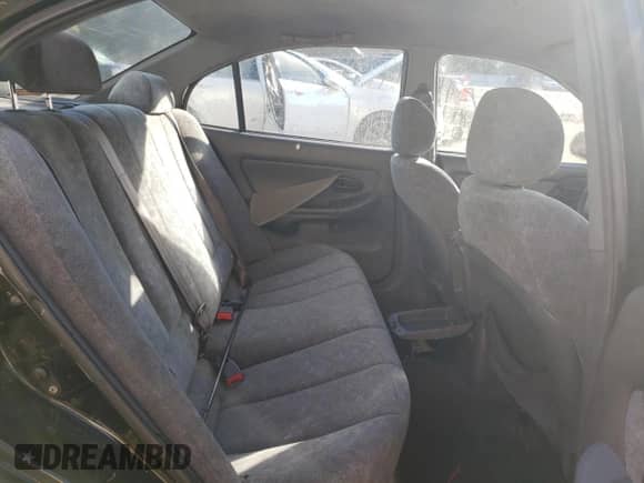 2001 Hyundai Elantra GLS z VIN KMHDN45D01U137872, wystawiony jako Copart lot #74987874 z przebiegiem 151 353 mil mil oraz Szkoda całkowita • Salvage title. Historia ofert i sprzedaży dostępna na DreamBid. Obrazek 10.