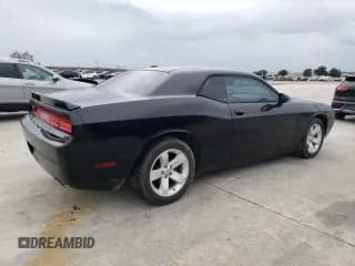 ✅ 2012 Dodge Challenger SXT • VIN: 2C3CDYAG7CH124959 • Lot: 70822264. Wystawiony na Copart z przebiegiem 184 413 mil. Bezpłatny archiwum sprzedaży aukcyjnych z USA i szczegółowy raport historii pojazdu na DreamBid. Zdjęcie 3.