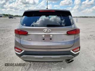 ✅ 2019 Hyundai Santa Fe SE • VIN: 5NMS23AD6KH088691 • Лот: 86144505. Опубликован ранее на Copart с пробегом 207 477 миль. Бесплатный доступ к архиву аукционных продаж из США и подробный отчёт об истории автомобиля на DreamBid. Изображение 6.
