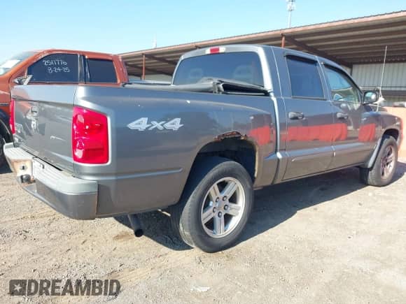 2007 Dodge Dakota SLT with VIN 1D7HW48K17S141534, listed as a IAAI auction lot 43202323 with 187,741 mi miles and . Bid and sale history available at DreamBid. Image 4.