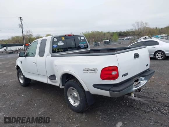 ✅ 1998 Ford F-150 XL • VIN: 2FTRX08L1WCB04886 • Lot: 41983810. Listed on IAAI with 185,909 mi. Free auction sales archive from the USA and detailed vehicle history report at DreamBid. Image 3.