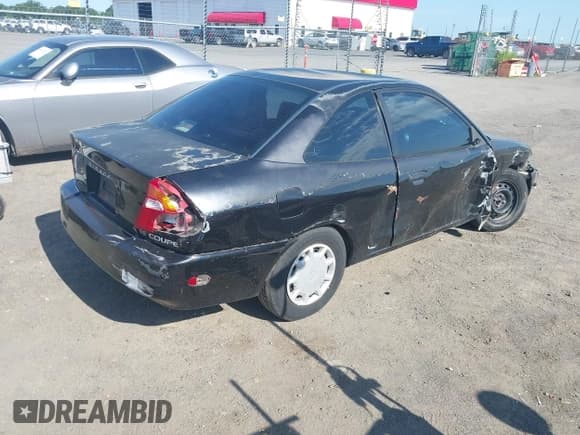 ✅ 2001 Mitsubishi Mirage DE • VIN: JA3AY11AX1U005791 • Lot: 42330594. Wystawiony na IAAI z przebiegiem 265 246 mil. Bezpłatny archiwum sprzedaży aukcyjnych z USA i szczegółowy raport historii pojazdu na DreamBid. Zdjęcie 4.