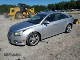 ✅ 2012 Chevrolet Cruze LTZ • VIN: 1G1PH5SC1C7126478 • Лот: 69722315. Опубликован ранее на Copart с пробегом 105 318 миль. Бесплатный доступ к архиву аукционных продаж из США и подробный отчёт об истории автомобиля на DreamBid. Изображение 1.