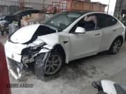 ✅ 2023 Tesla Model Y Long Range • VIN: 7SAYGAEEXPF789037 • Lot: 41551605. Listed on IAAI with 8,630 mi. Free auction sales archive from the USA and detailed vehicle history report at DreamBid. Image 2.