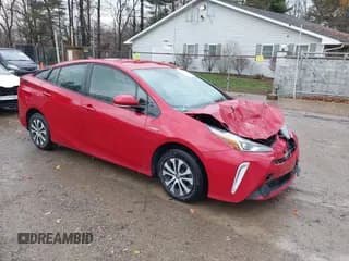 ✅ 2020 Toyota Prius LE • VIN: JTDL9RFU5L3018496 • Lot: 43782967. Listed on IAAI with 100,146 mi. Free auction sales archive from the USA and detailed vehicle history report at DreamBid. Image 1.