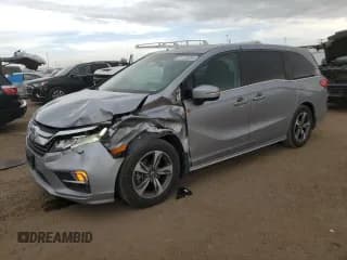 ✅ 2018 Honda Odyssey Touring • VIN: 5FNRL6H89JB001811 • Lot: 71126095. Wystawiony na Copart z przebiegiem 102 409 mil. Bezpłatny archiwum sprzedaży aukcyjnych z USA i szczegółowy raport historii pojazdu na DreamBid. Zdjęcie 1.